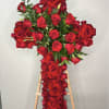 Large red rose cross on a wooden easel