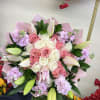 Pink and white rose bouquet with lilies and lavender flowers