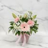 A vibrant arrangement of  pink Gerbera daisy, soft light pink lilies