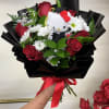 Celebrate her big accomplishment with the sweetest graduation bouquet featuring luxurious red