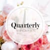 Pink and white floral arrangement with a 
