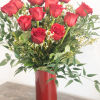 1 Dozen long stem roses arranged in a beautiful vase with fill.