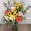 Daises, roses, lilies, and more! This custom arrangement will include approximately 8-9