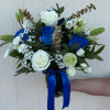 Blue and Whie Rose Arrangement in a black Cantarito ( mexican reusable