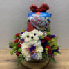 Birthday flower arrangement with a balloon topper and colorful blooms