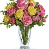 Pink lemonade, anyone? This stunning bouquet of pink and yellow roses adds