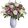 Our Marvelous Moments Bouquet features cr&egrave;me roses, lavender roses, lavender sinuata statice