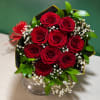 A beautiful grab-and-go bouquet featuring premium red roses, baby&rsquo;s breath, and fresh