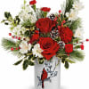 Teleflora's Woodland Cardinal Bouquet is a festive winter favorite! Red roses and