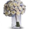 Full of classic charm, this country-inspired bouquet features delicate limonium among light