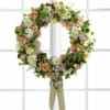 The FTD&Acirc;&reg; Garden Splendor&acirc;&cent; Wreath will bring a sweet grace to your
