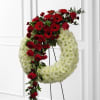 The FTD Graceful Tribute Wreath creates a stunning presentation 
of love's serenity