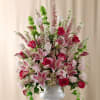 The FTD&Acirc;&reg; Solemnity&acirc;&cent; Arrangement is the perfect accent piece for the 
ceremony