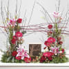 Geometrically attractive arrangement for the urn of a cherished loved one. Fushia