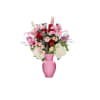 Pink and red flowers arranged in a pink vase