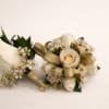 Corsage and Boutonniere matching set. The same flowers, filler and ribbon will