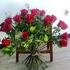 Large bouquet of red roses with greenery and filler