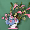 Spectacular creation combining pinks ginger, snap dragons, scabiosas, to exclaim WOW!

