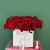 Medium and discreet charming arrangement of red roses.