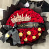 Bouquet of red roses with a tiara and black ribbon