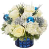 White roses and hydrangeas in a blue glass vase with blue ornaments