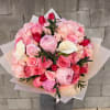 Large bouquet of pink roses, peonies, and white calla lilies