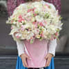Beautiful mixed flowers in our signature pink velvet box.