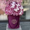 Standard 50 Pink and Purple roses in our signature burgundy velvet box
