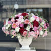 Premium choice of flowers in a vintage style ceramic vase