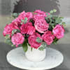 Fresh heart shaped roses with eucalyptus in a vase 