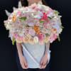 Beautiful flowers mix with premium flowers in a gray velvet box