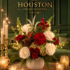 This refined holiday arrangement blends winter elegance with warm seasonal charm. Creamy