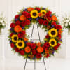 Our Tuscan wreath is a vibrant mix of yellow, red and orange
