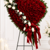 Bleeding Heart Funeral Flowers with Red Roses from Houston Fresh Flowers. The