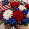 A patriotic 4th of July arrangement with red roses and white and