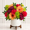 Brighten any occasion with the cheerful beauty of the Peach Blossom Delight&trade;.