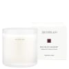 White three-wick candle in a frosted glass jar with a box behind it