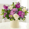 Handcrafted elegance, these beautiful stems of roses, stock and alstroemeria make a