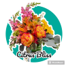 Bouquet of orange, pink, and yellow flowers with eucalyptus