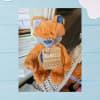 Small plush orange fox with blue accents, stitched smile!

If you love to