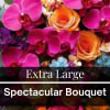 Bright bouquet of pink orchids and orange roses