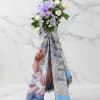 A gently reverent sympathy arrangement, this memorial floral spray with The Lord's