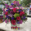 Bright hot-pink roses take center stage in this Birthday Bundle, a playful