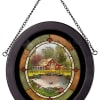 Round hanging stained-glass-style panel with a farm scene