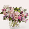 Pretty in pink, this sweet gift is full of alstroemeria, carnations, and