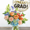Celebrate their big achievement with a bright and elegant Graduation Floral Arrangement
