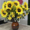 Sunflower bouquet in an amber glass vase