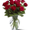 Bouquet of red roses in a clear glass vase