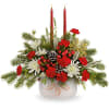 Teleflora's Happy Holly Centerpiece is brimming with holiday cheer! Festive blooms and