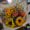 Bright handheld bouquets full of sunshine and love.  Looking for a